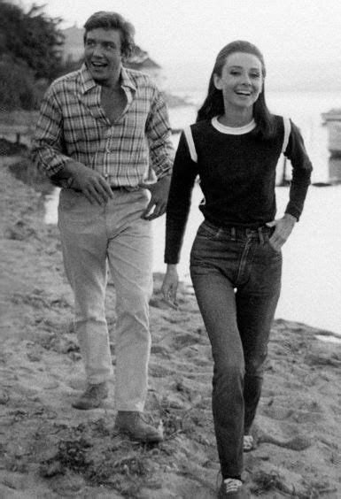 Albert Finney and Audrey Hepburn, walking on the beach in Two For The Road, France, 1966 ...