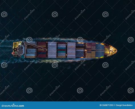 Aerial View Of Cargo Container Ship In The Sea At Night Stock Image