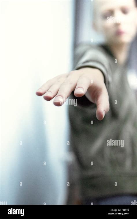 Woman reaching for something just out of reach, personal perspective Stock Photo: 88203814 - Alamy