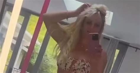 Britney Spears Writhes On Pole In Teeny Bikini And Knee High Boots In