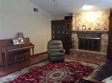 Traditional living room with brick fireplace | Traditional living room ...