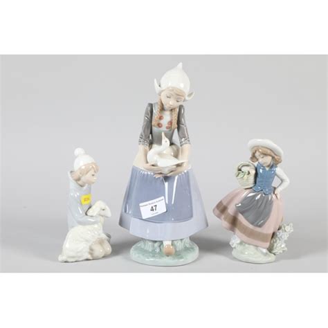 Three Lladro Porcelain Figures Lady With Goose Girl With Basket Of