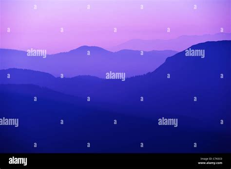 violet sunset in the mountains Stock Photo - Alamy