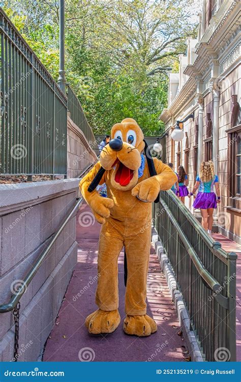 Disney Pluto Character Costume At Disneyland Parade Editorial Photo ...