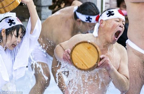 Japanese Bathers Pour Freezing Water Over Themselves In New Year