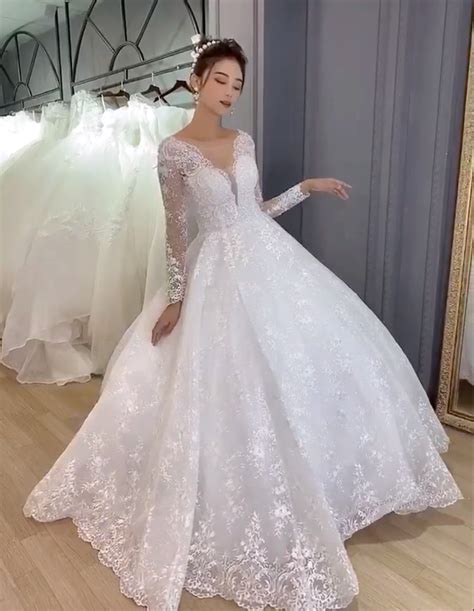 Dreamy Princess Long Sleeves Deep V Neck Floral Lace Whiteivory Ball Gown Wedding Dress