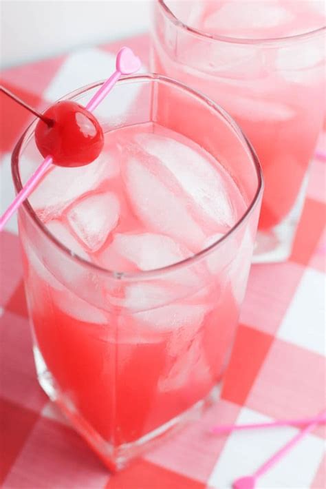 Boozy Pink Lemonade Punch | Champagne and Coconuts