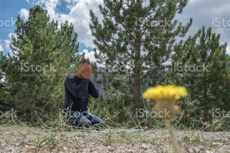 Man Praying Outdoors In Nature Stock Photo - Download Image Now - 40-44 Years, Adult, Adults ...