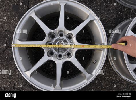 measure car wheel diameter size Stock Photo - Alamy