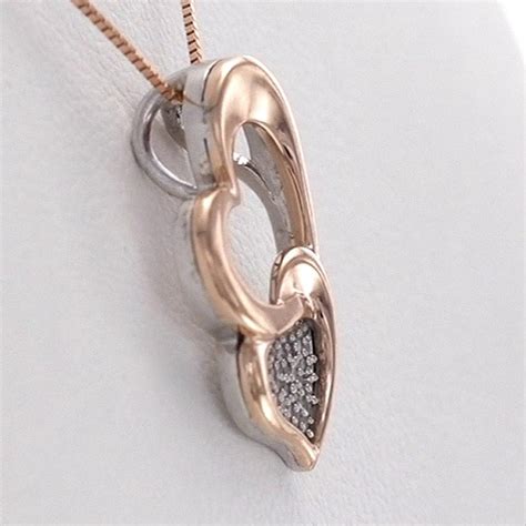 1 15 Ct T W Composite Diamond Tilted Double Heart Pendant In Sterling Silver With 10k Rose