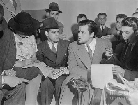 Orson Welles Explaining Radio Broadcast by Bettmann