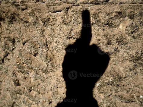 Fuck You Off Medium Finger Raised Hand Silhouette On Wall Stock Photo At Vecteezy