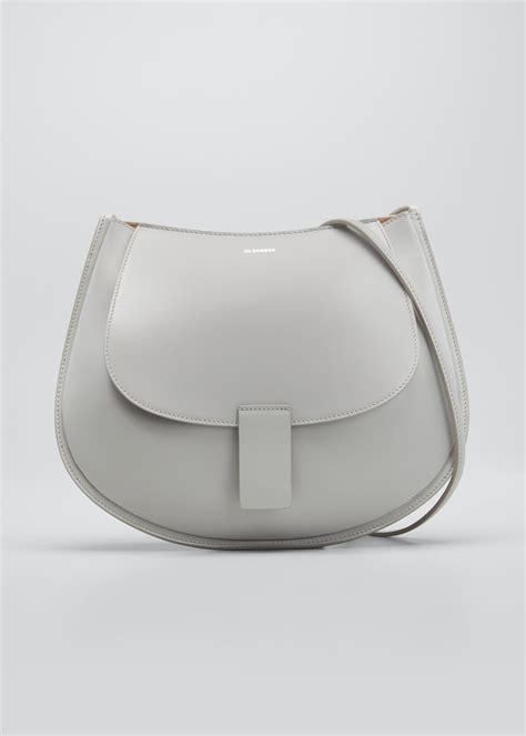 Jil Sander Crescent Small Saddle Crossbody Bag Milk Editorialist