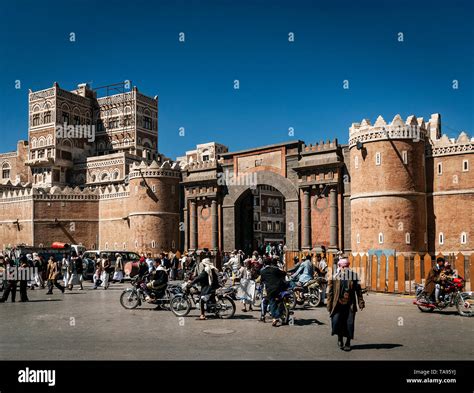 street scene and local heritage architecture buildings in old town of sanaa yemen at Bab Al ...