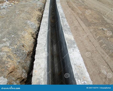 U Shape Precast Concrete Drain Laid By Construction Workers At The Site