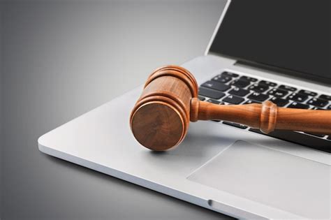 Premium Photo Gavel On Laptop Keyboard Close Up View