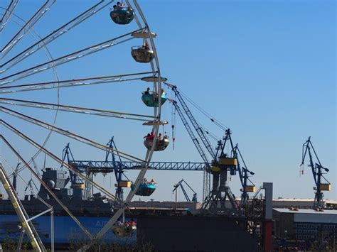 Premium Photo Ferris Wheel Against Blue Sky