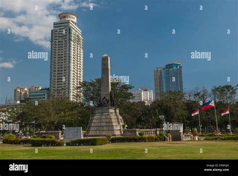 Skyline of Central Manila seen from Rizal Park Stock Photo - Alamy