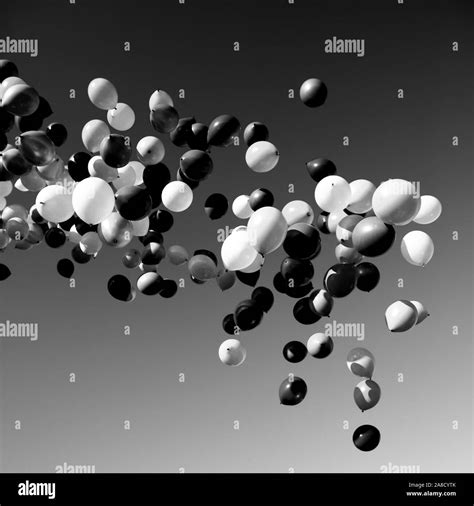 White Balloons In The Night Sky Stock Photo Alamy