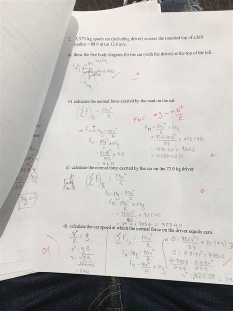 Solved A Kg Sports Car Including Driver Crosses The Chegg