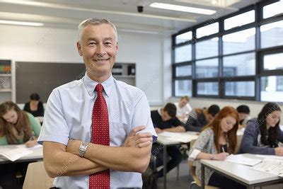 Mature Male Teacher In Classroom Stock Image F009 9689 Science