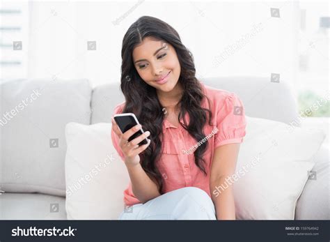 Smiling Cute Brunette Sitting On Couch Stock Photo Shutterstock