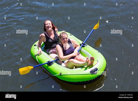 Woman Relaxing In Inflatable Boat Dinghy Hi Res Stock Photography And