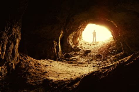 Man Standing In A Cave Mouth Stock Photo Free Download