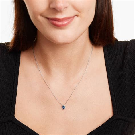 14K White Gold Blue Sapphire And Diamond Halo Necklace 37007w14