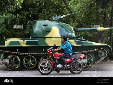 HOMEMADE TANK TAKES TO THE STREETS Residents of Hangzhou, China, may ...