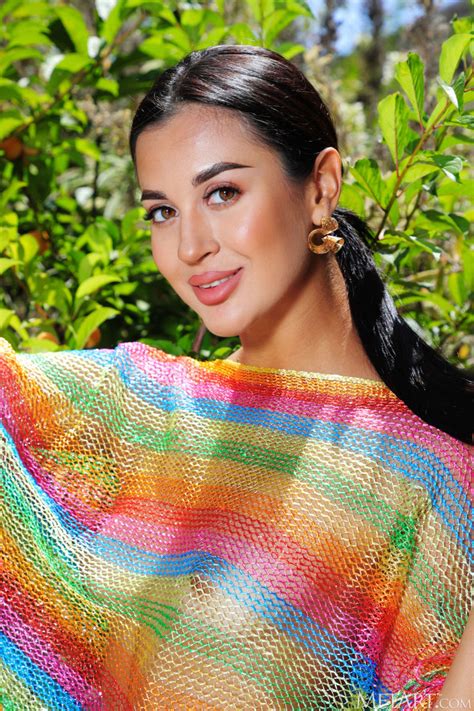 Victoria Mur In Her Rainbow Poncho