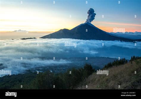 Volcano Eruption At Sunrise Mount Agung Bali Indonesia Stock Photo