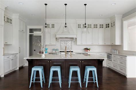 Blue Tolix Stools At Brown Kitchen Island Transitional Kitchen