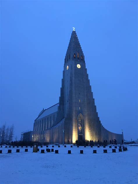 Church in downtown Reykjavik, as snow starts falling on Christmas Eve ...