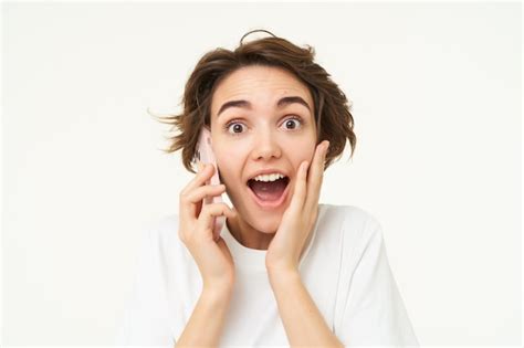 Free Photo Portrait Of Woman With Surprised Face Answers Phone Call