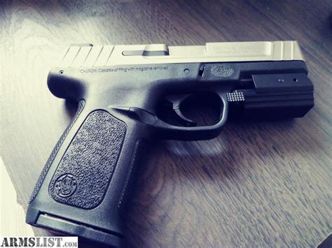 ARMSLIST - For Sale: 9mm smith & wesson Sd9ve with low profile lazer