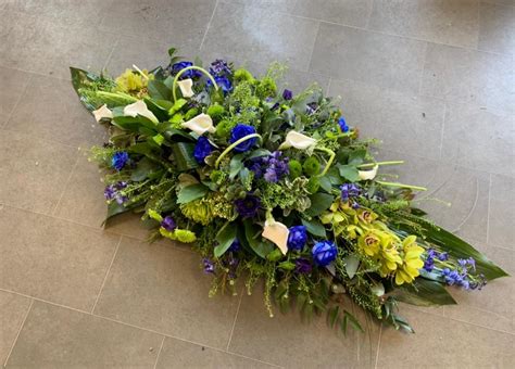 modern coffin spray butterfly flowers