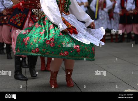 Polish folk dance group with traditional costume Stock Photo - Alamy