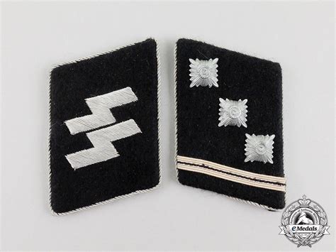 A Fine Set Of Waffen Ss Obersturmführer Collar Tabs Emedals