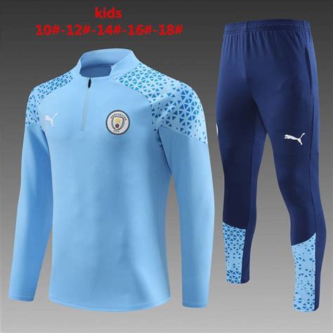 Chandal con sueter media cremallera niño MANCHESTER CITY 2023 2024