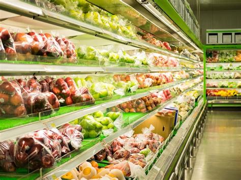 Premium Photo Fruits On Shelves At Supermarket