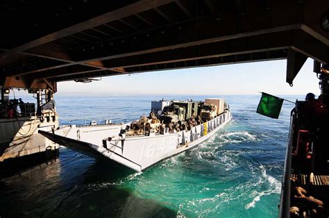 A Landing Craft Utility Departs The Well Deck Of The NARA DVIDS