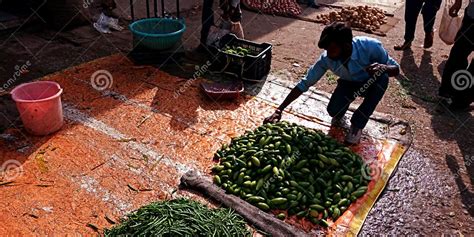 An Indian Farmer Arranging Vegetable At Street Shop Editorial Stock