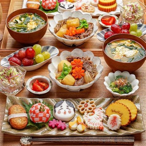 A Table Topped With Bowls Filled With Different Types Of Food And