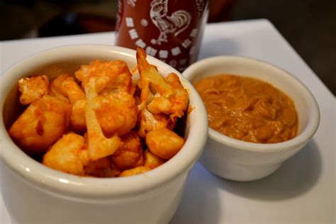 Sriracha Cauliflower Bites With Peanut Ginger Dipping Sauce