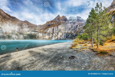 Spectacular Autumn View Of Oeschinensee Lake Stock Photo Image Of