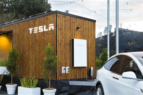 Tesla's Futuristic Tiny House Shows Off Its Energy Products