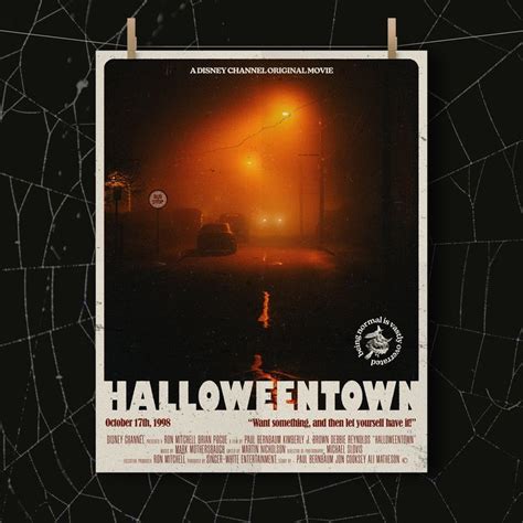 a movie poster with the words halloween town on it