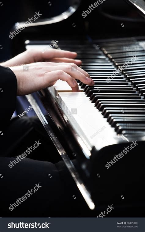 Pianist Playing Piano In Wroclaw In Memory Of Frederic Chopin Stock