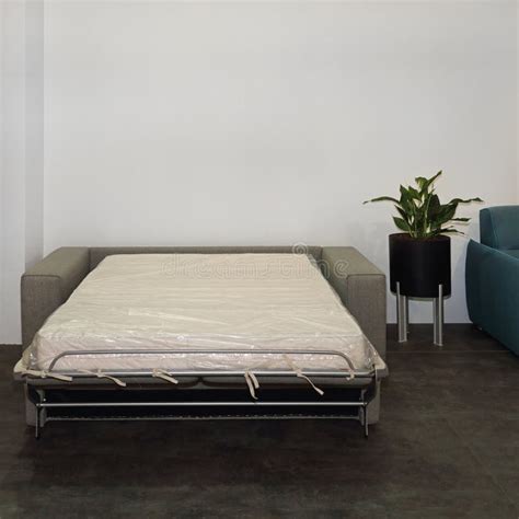 how to open a couch bed